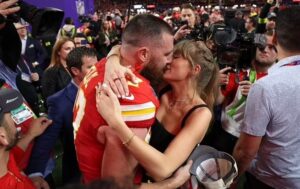 Travis Kelce wraps his arms around Taylor Swift at his potential last Eras Tour show before jetting to Chiefs training camp