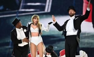 Travis Kelce wraps his arms around Taylor Swift at his potential last Eras Tour show before jetting to Chiefs training camp